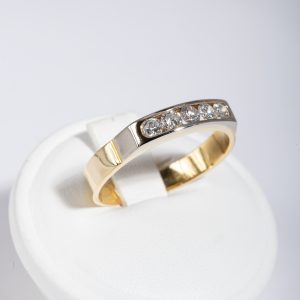 Anello riviera oro giallo con ghiera oro bianco 18k e diamanti 0,25ct