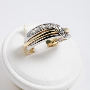 Anello bicolore oro giallo e bianco 18k con diamanti 0,15ct