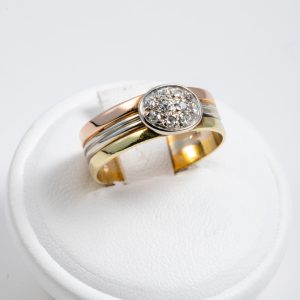 Anello tre ori 18k con pavé di diamanti 0,10ct