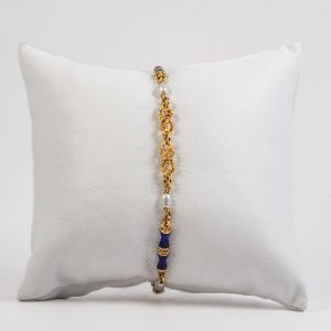 Bracciale oro giallo 18k con perle e inserti laccati blu