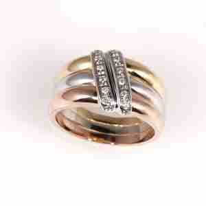 Anello tre colori oro 18k e brillanti tot. ct.0,10